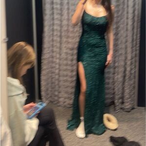 Once worn prom dress in emerald green. For reference I am 5’7.